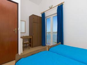Postel nebo postele na pokoji v ubytování Apartments Pletikosa Gaj