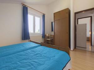 Postel nebo postele na pokoji v ubytování Apartments Pletikosa Gaj