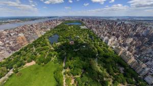an aerial view of a city with trees and buildings at 7 Bed Haven Sleeps 12 20Min to NYC Massage Chair in Bayonne