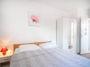 Postel nebo postele na pokoji v ubytování Apartments Matija