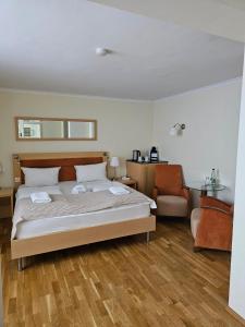 Postel nebo postele na pokoji v ubytování Hotel Goldene Rose
