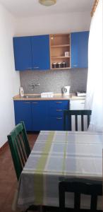 Kuchyň nebo kuchyňský kout v ubytování Apartments Bruna