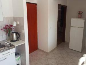 Kuchyň nebo kuchyňský kout v ubytování Apartments Pletikosa Gaj