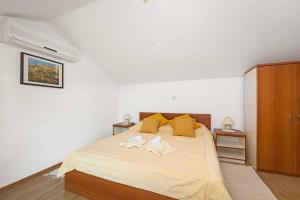 Posteľ alebo postele v izbe v ubytovaní Apartments Kaina