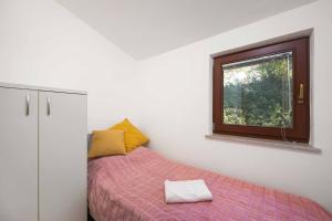 Posteľ alebo postele v izbe v ubytovaní Apartments Kaina