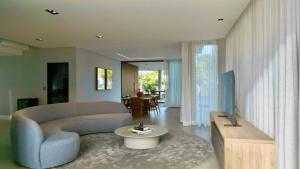 Posezení v ubytování Mansão em Guarajuba – 7 Suítes a 50m da Praia!