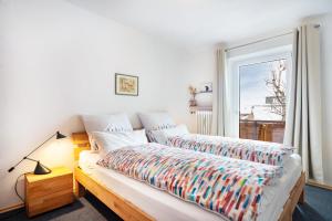 Postel nebo postele na pokoji v ubytování Haus Bergliebe - Breitenbergblick