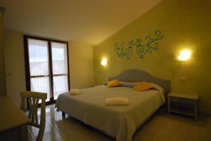 Postel nebo postele na pokoji v ubytování Hotel Jasmine