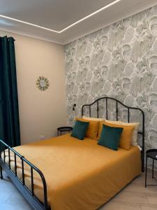 Postel nebo postele na pokoji v ubytování B&B Vittoria
