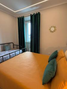 Postel nebo postele na pokoji v ubytování B&B Vittoria