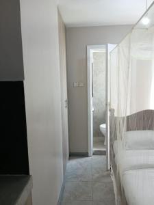 Una cama o camas en una habitación de Tsavo Dulexe homes