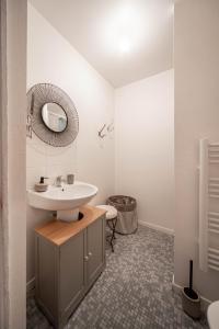 Koupelna v ubytování L'appartement Cosy