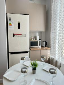 Kuchyň nebo kuchyňský kout v ubytování Capital city, Жилой комплекс