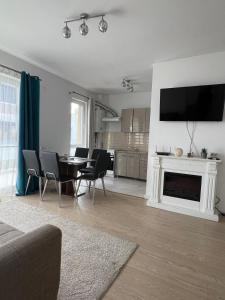 Μια τηλεόραση ή/και κέντρο ψυχαγωγίας στο Rose Residence