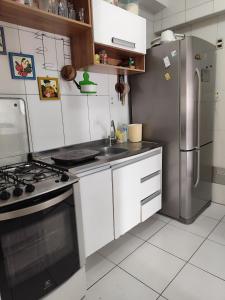 Køkken eller tekøkken på Apartamento Dois Quartos - Garagem - Localização excelente em Brotas