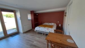 Katil atau katil-katil dalam bilik di Studio neuf 25m2 - 2 personnes
