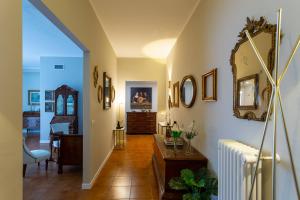 a hallway of a home with a living room at HouSmart Lorenzo Costa 17 in Bologna +35 photos