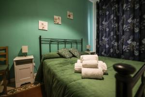Postel nebo postele na pokoji v ubytování Ai Tintori