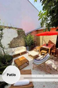 En terrasse eller udendørsområde på Havre de paix