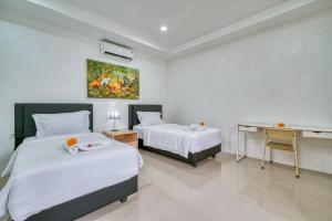 Ένα ή περισσότερα κρεβάτια σε δωμάτιο στο 2 Bed modern Apartment with big pool +25 φωτογραφίες