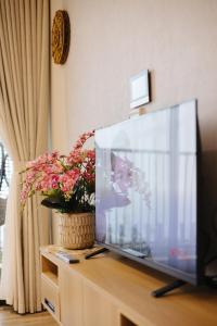 TV a/nebo společenská místnost v ubytování Ecopark QV Homestay LANDMARK