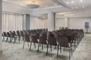 The business area and/or conference room at NH Catania Centro