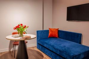 A television and/or entertainment centre at NH Catania Centro