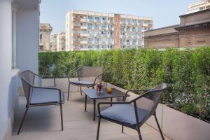 A balcony or terrace at NH Catania Centro