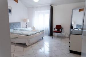 Postel nebo postele na pokoji v ubytování Druso Rooms