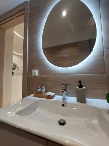 Koupelna v ubytování City Center Residence