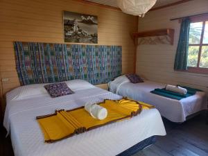 Postel nebo postele na pokoji v ubytování Hotel y Restaurante Casa Loma