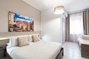 A bed or beds in a room at B&B Kalurya - Lecce Selection
