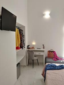 TV a/nebo společenská místnost v ubytování B&B Valentì