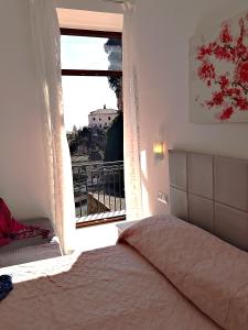 Postel nebo postele na pokoji v ubytování B&B Valentì