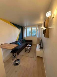 O zonă de relaxare la Studio neuf tout équipé - Calme - Proche centre ville - Parking gratuit