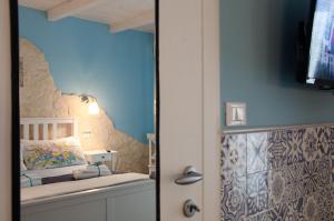 ジャッレにあるCasa della Perla, Parcheggio disponibile, centraleのベッドルーム1室(ベッド1台付)、