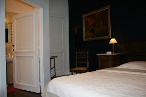 Postel nebo postele na pokoji v ubytování Château de Bonne Espérance