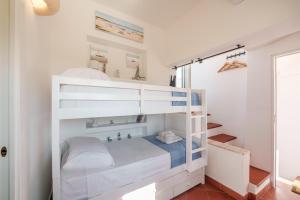A bed or beds in a room at TORRETTA CORRICELLA- Torretta