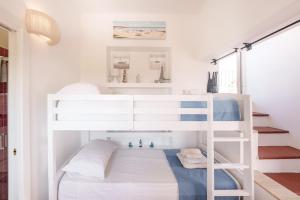 A bed or beds in a room at TORRETTA CORRICELLA- Torretta