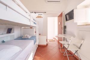 A television and/or entertainment centre at TORRETTA CORRICELLA- Torretta