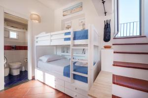 A bed or beds in a room at TORRETTA CORRICELLA- Torretta