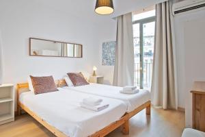 Posteľ alebo postele v izbe v ubytovaní Beautiful apartment in Las Ramblas Barcelona 6pax