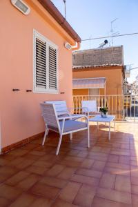 A balcony or terrace at Endless Summer Apartment
