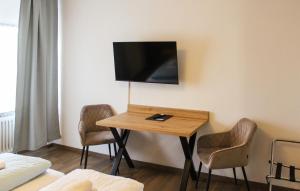TV a/nebo společenská místnost v ubytování Hike Inn Hotels by Simonis