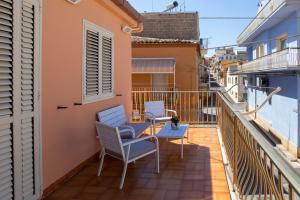 A balcony or terrace at Endless Summer Apartment