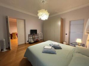 Postel nebo postele na pokoji v ubytování Paradise Rooms - Brignole Station