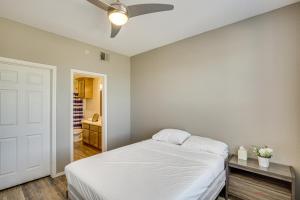 a bedroom with a bed and a ceiling fan at Close to Lakes, Parks and Winery Bonham Apt in Bonham