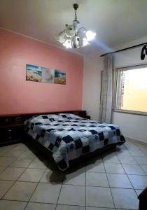 Postel nebo postele na pokoji v ubytování Casa Vacanza Delfino Rosa