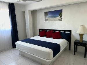 Ένα ή περισσότερα κρεβάτια σε δωμάτιο στο Hotel Independencia
