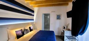 Postel nebo postele na pokoji v ubytování Stella del Garda
